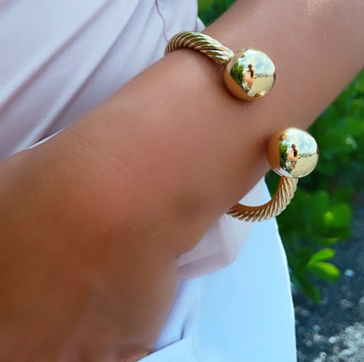 18k Gold Layered Twisted Bangle Featuring Two Solid Balls On Top Wholesale