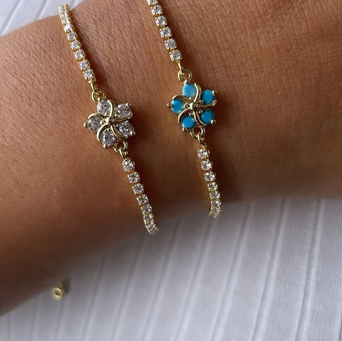 18k Gold Filled Adjustable Tennis Bracelet With CZ Flower Charm In Center